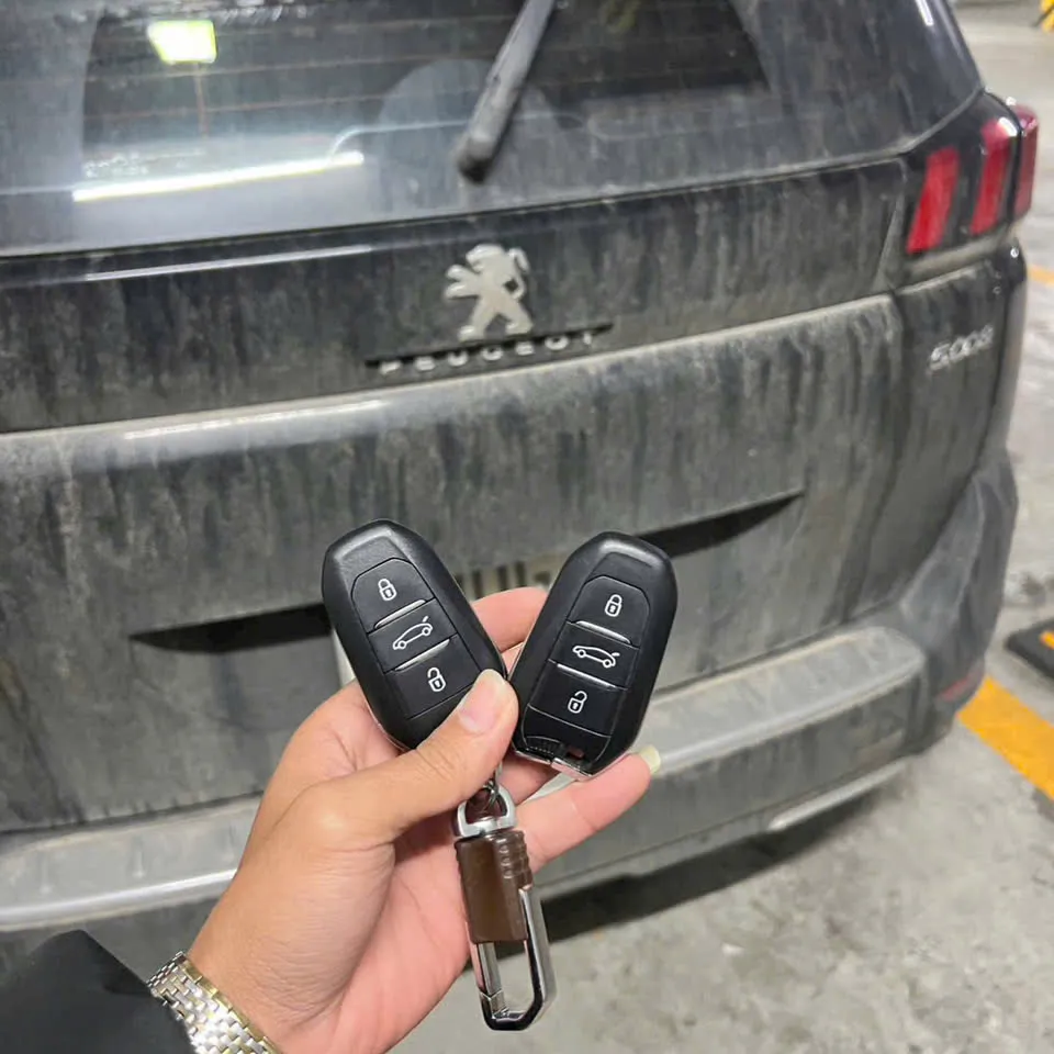 Làm chìa khóa Peugeot 5008 – ảnh thực tế 1